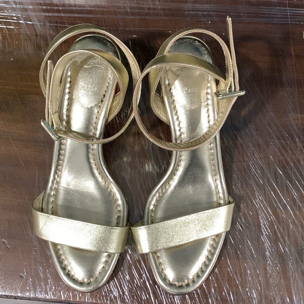 Gold Christian Louboutin, size 37. 2.5” heel